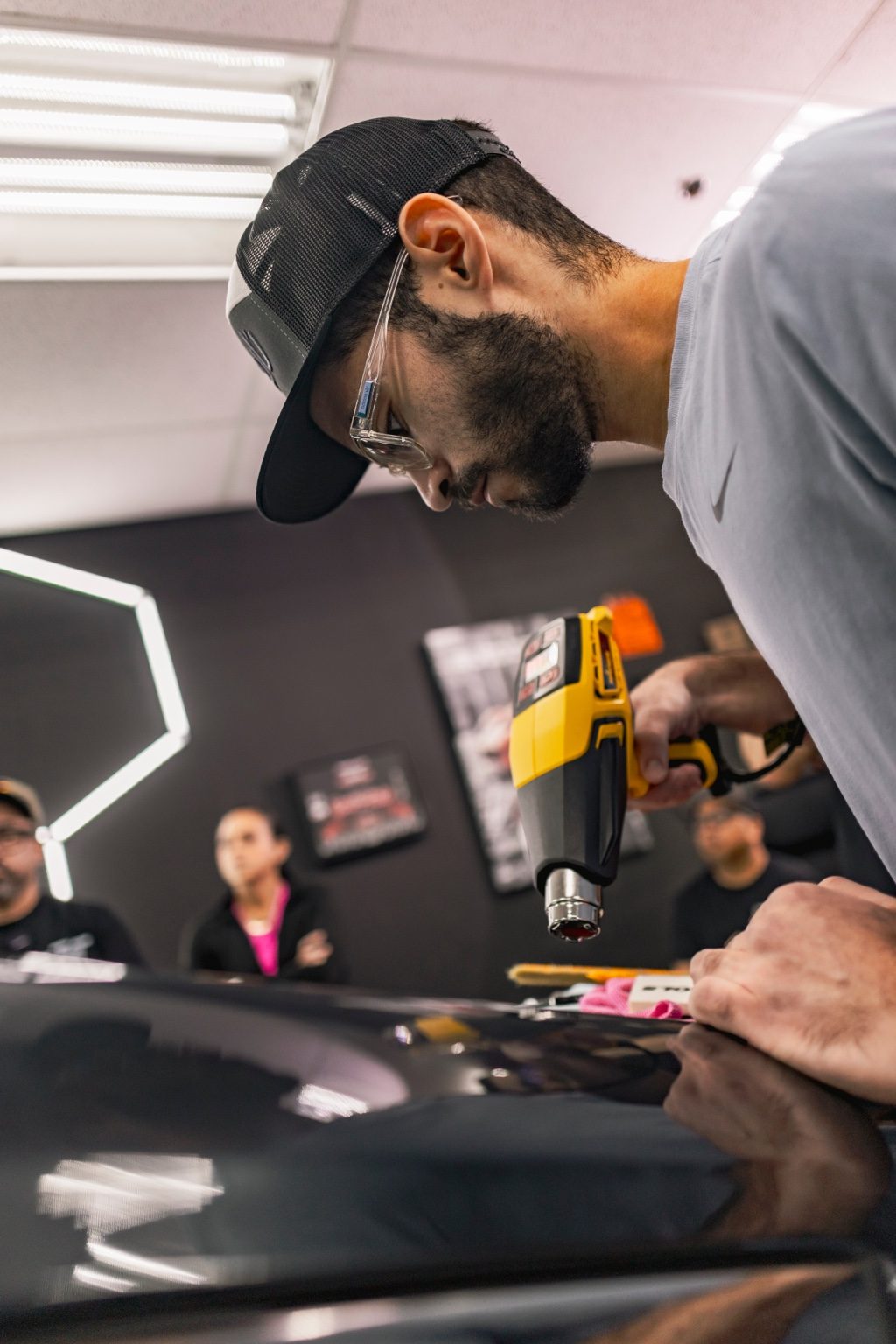 Marco Cazorla teaching hands-on window tint training